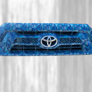 Front grill on a Toyota truck that has been hydro-dipped